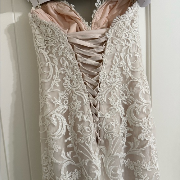 Maggie Sottero Wedding Dress
Strapless Sweetheart Neckline Trumpet Style - Picture 10 of 12